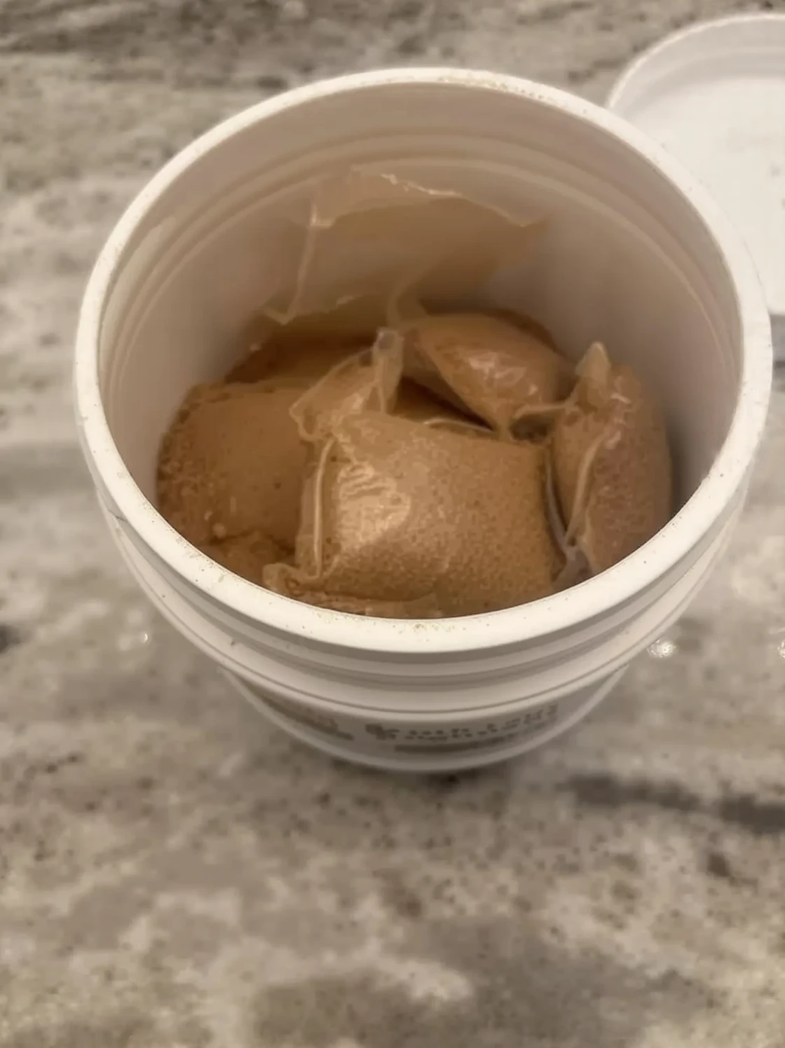 Customer photo of septic tank additive powder in its packaging and container