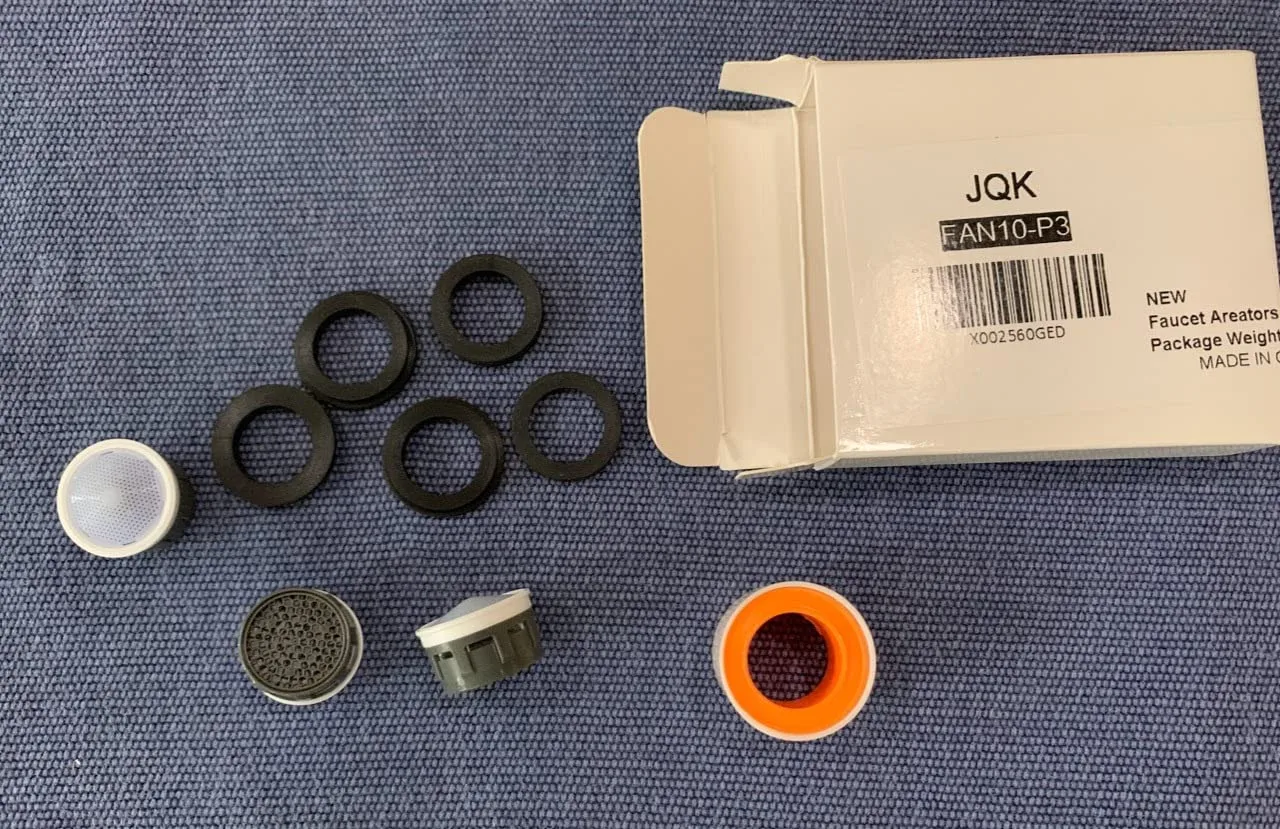 Customer photo of low-flow toilet upgrade kit components and installation hardware