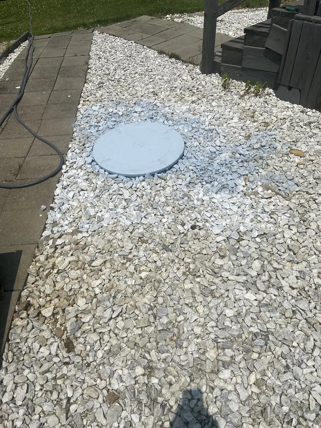 Customer photo of tank riser installed on septic tank showing elevated access