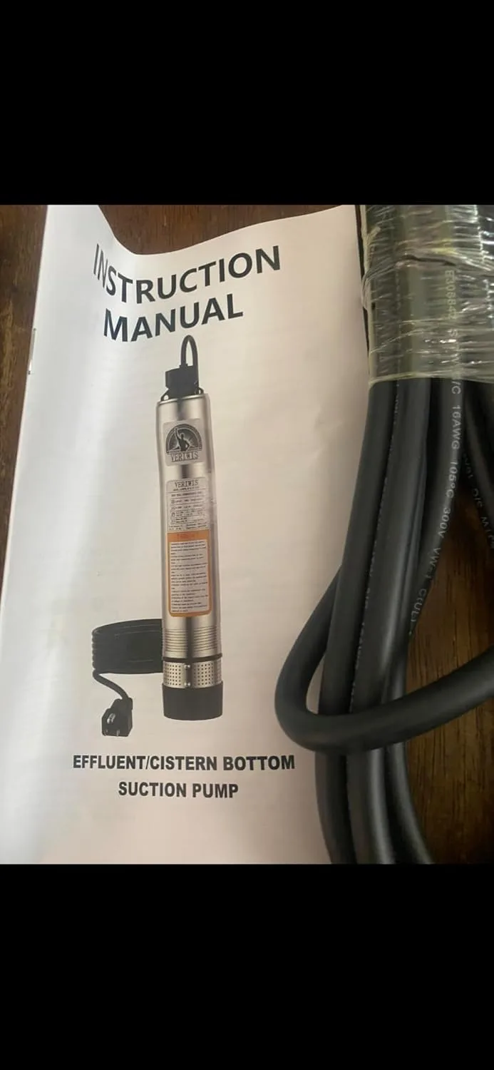 Customer photo of aerobic septic system pump with packaging and installation components